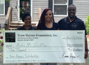 Ronnie and Naquita Haynes of The Team Haynes Foundation presented a $2,000 Team Haynes Scholarship to Aisha M. Griffin.