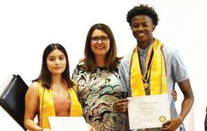 Shannon Neal presented the $1,000 J.D. Smith Rotary Club Scholarship to Mariana Angeles- Martinez and Steffon Terrell.